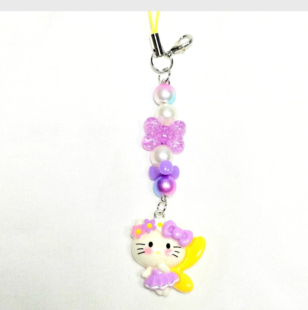 Whimsical Kawaii Hello Kitty Resin Pastel Purple and Yellow Cute Girly Giftable Keychain or Phone Bag Charm